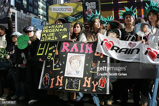 Fans are seen outside while South Korean pop singer Rain appears during a taping of "MTV World Presents: Rain - Live in New York" at the MTV Times...