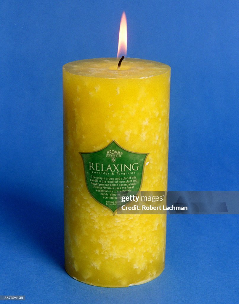 LS.Spa.Candle.RDL (kodak) (12/31/97) (Costa Mesa, CA) A candle for the discoveries column, essential