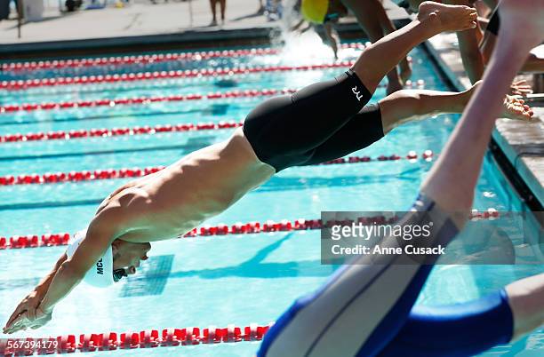 Lucas McCrory who has dwarfism, competes in the 400-meter freestyle during the 2014 Pan Pacific Para-Swimming Championships at the Rose Bowl Aquatics...