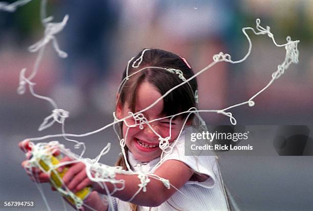 Berry.String.052398.RLSilly String seemed to go well with berries and fun at the annual Strawberry Festival in Garden Grove saturday morning.