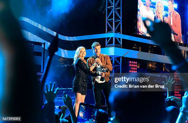 July 24 2014: 'Game of Thrones' actors Natalie Dormer, left, and Nikolaj Coster-Waldau, right, accept the 'OMG Moment of the Year' award for the...