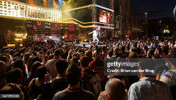 July 24 2014: 'Teen Wolf' actor Tyler Posey, left, and YouTube personality Tyler Oakley, right, are on stage at the first-ever "mtvU Fandom Awards"...