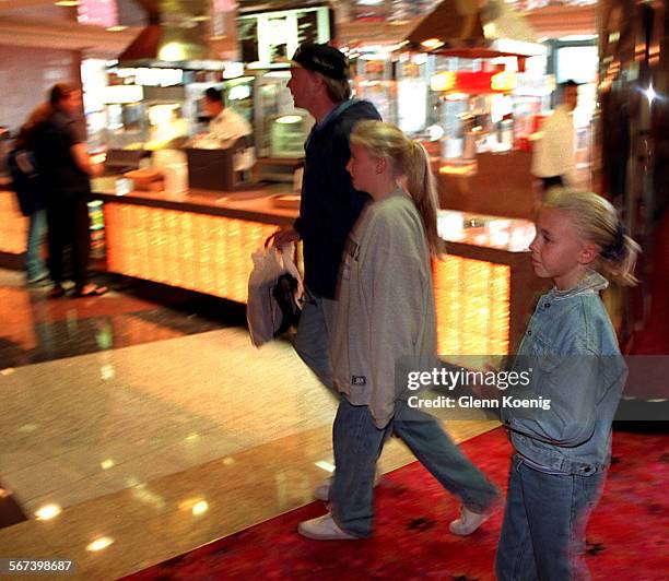 Teens.Kaitlin.0207.GKleft to rightMike Tyre and his daughters Michele Tyre, age 11 and Kaitlin Tyre age 8, are on their way to see Titanic for the...