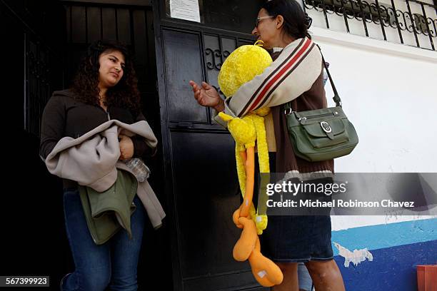 Year-old Sindy Marieliza Laurel Palma is greeted buy her grandmother after being deported from Mexico. She was staying at a shelter created...