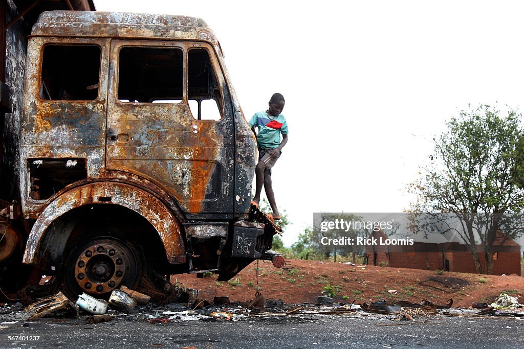 BODANGA II, CENTRAL AFRICAN REPUBLIC --MONDAY, MARCH 10, 2014 --  Paul (no last name given), climbs 