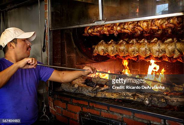 German Velasco tanking the Rotisserie Chicken at Pollo a La Brasa, June 20, 2014.