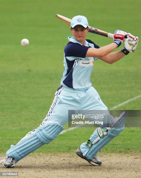 Leah Poulton of the Breakers hits out during the 2nd Final between the New South Wales Breakers and the Queensland Fire at North Sydney Oval February...