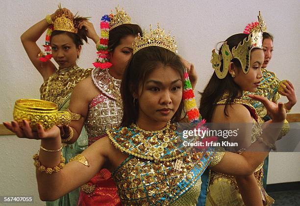 Cambodian.1.0406.IK ; Fullerton, April 06Chhavy Sy , center, and other students dressed as goddesses practicing "Wishing Dance" which they will...