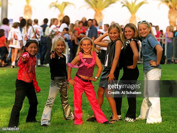 Spears1.AS Young girls show off their fashion prior to the Britney Spears concert Saturday July 30 at the Verizon Wireless Amphitheater. Left to...