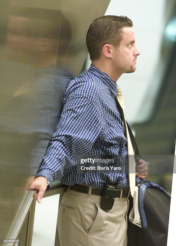 Nothing for Brian Somero (cq) to do but keep his cell phone holstered while waiting for the subway t