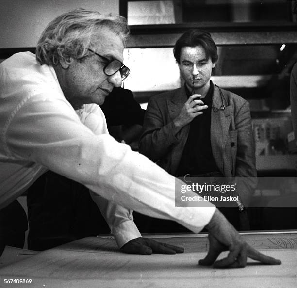 EsaPekka Salonen, right, new musical director for the L.A. Philharmonic, looks at plans for the new concert hall with architect Frank Gehry, left.