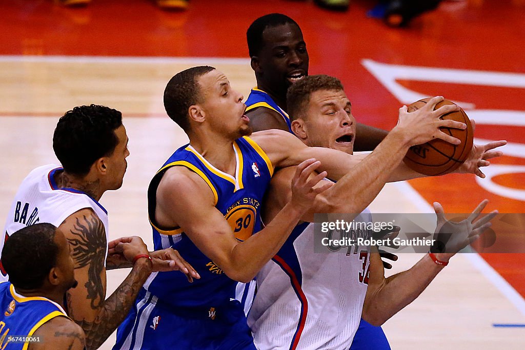 LOS ANGELES, CA, TUESDAY, APRIL 29, 2014 - Clippers forward Blake Griffin battles Warriors guard Ste