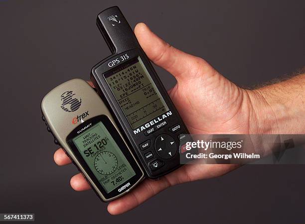 This is an Ereview for the main Business section on handheld GPS units. On the left is the Etrex unit, on the right is the Magellan unit.