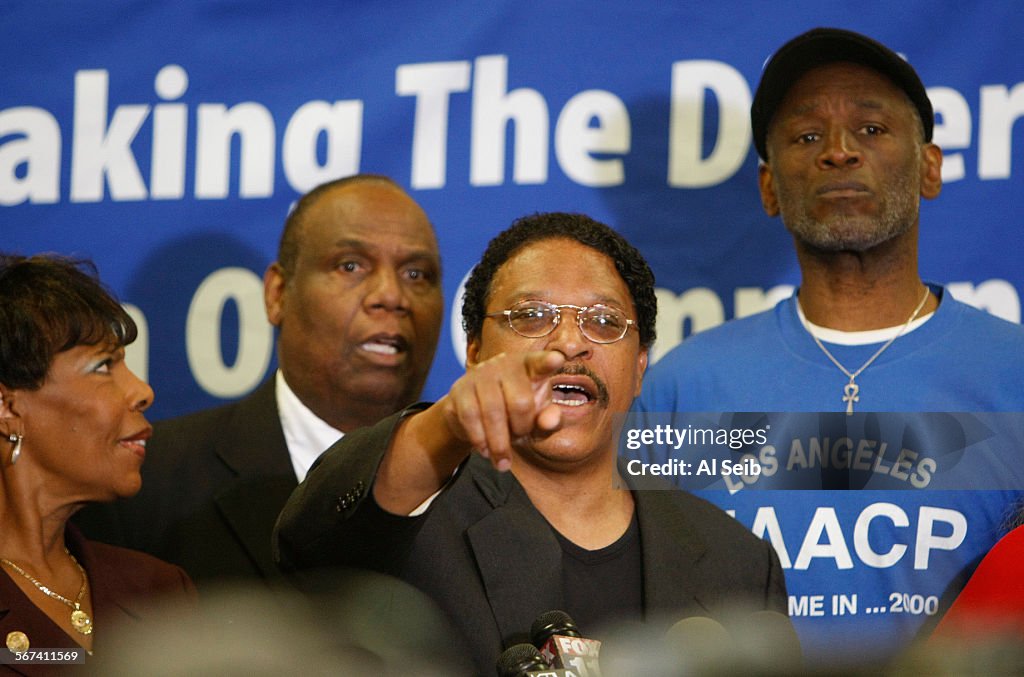 CULVER CITY, CA  APRIL 28, 2014 - Leon Jenkins, center, president of the Los Angeles branch NAACP, a