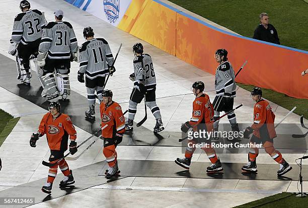 The LA Kings and the Anaheim Ducks arrive via centerfield at Dodger Stadium during pregame ceremonies of the NHL Stadium Series.