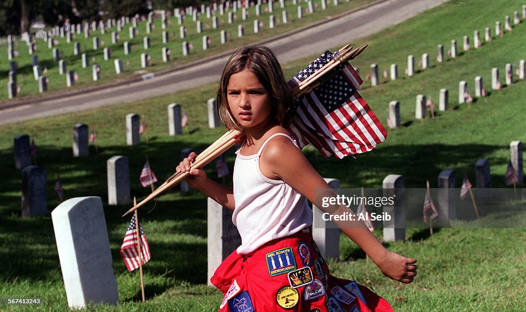 009204.ME.0527.memorial.4.AS Alexandria Gracian, 9 from GirlScout troop 1138 in the San Fernando Val