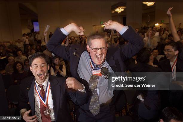 Simi Valley High School Academic Decathlon team members celebrate their winning the state championship in the 21st Annual event, Sunday at the LAX...