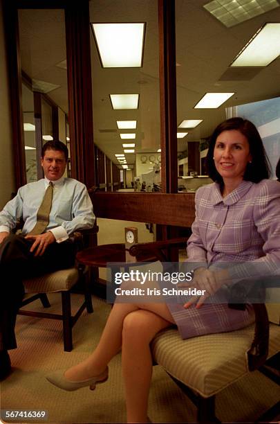 Dealmakers.2.0312.Peter Barker, managing director with Goldman Sachs in LA and Suzanne Nora Johnson an investment banker .They are two top investment...