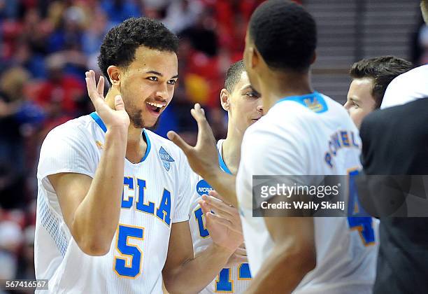 IUCLA's Kyle Anderson smiles as he walks off the court with a big lead over Stephan F. Austin in the Third Round of the NCAA Tournament at Viejas...