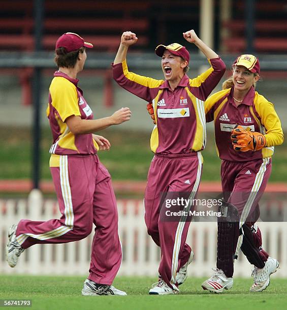 Louise Broadfoot of the Fire celebrates taking a catch to dismiss Michelle Goszko of the Breakers during the 2nd Final between the New South Wales...