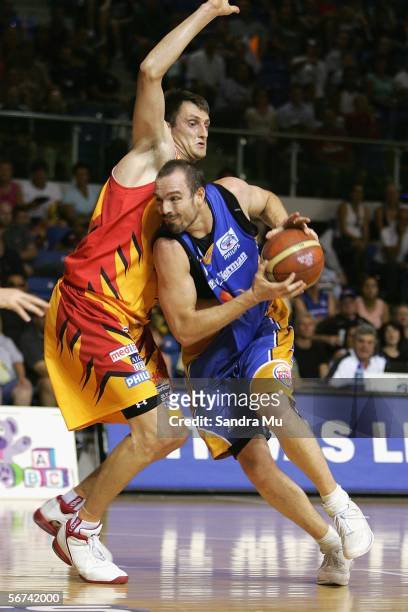 Ben Pepper of the Breakers pushes past Chris Anstey of Melbourne during the round 23 NBL match between the New Zealand Breakers and the Melbourne...