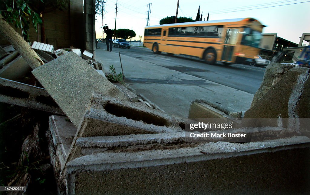 ANAHEIM,CA.,MARCH 10, 2014: A school bus rolls past the site on East Street in Anaheim where a man a