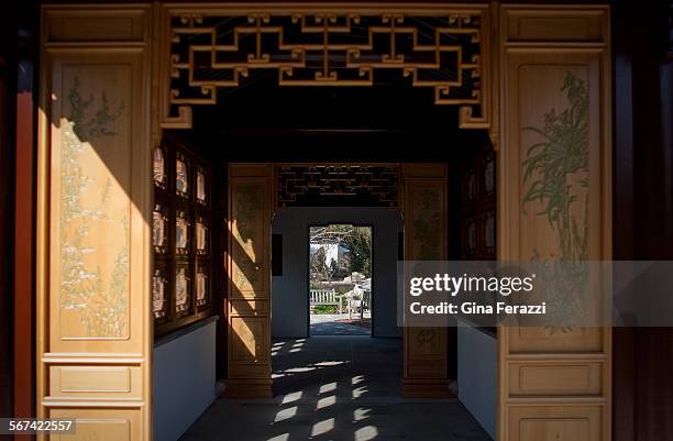 Calligraphy lines the columns inside the Waveless Boat Pavilion at the Huntington Chinese Garden on February 19, 2014 inside the Huntington Library,...