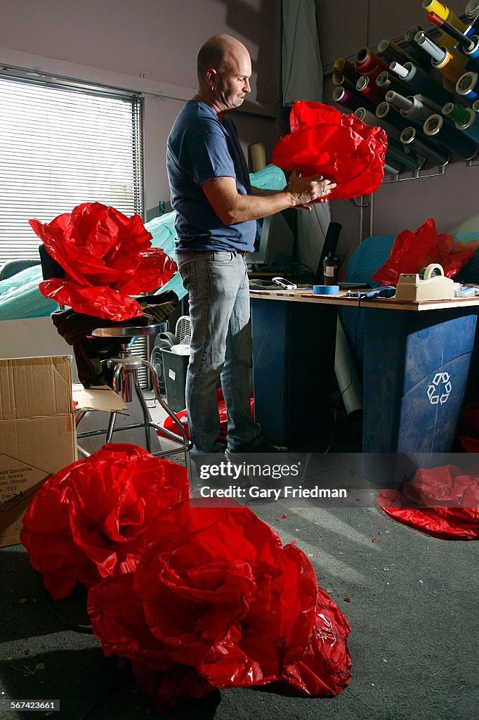 SHERMAN OAKS, CALIFORNIA - JANUARY 21, 2013: Sam Rhymes makes polyester (fabric) petals at Goodnight