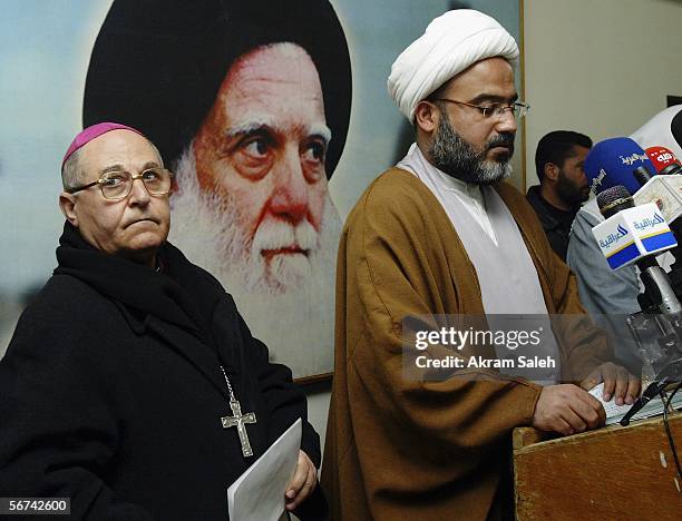 Sheikh Abdul-Hadi al-Daraji , spokesman for Muslim Shiite cleric Moqtada Sadr speaks during a press conference as Christian priest Shleimon Wardoni...