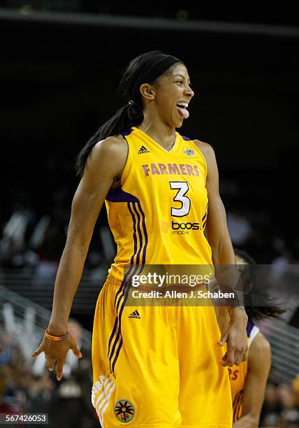 Los Angeles Sparks forward Candace Parker celebrates scoring over the San Antonio Silver Stars in the fourth quarter of the first round of the WNBA...