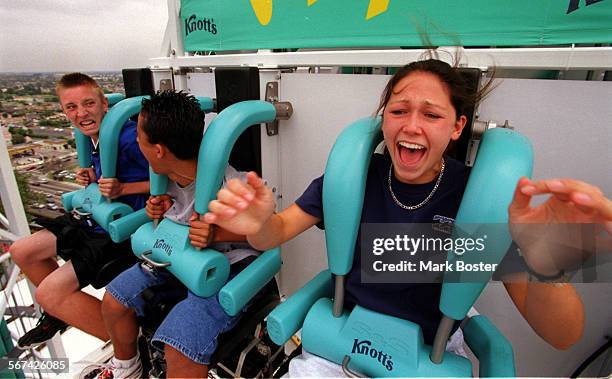 Scream.Screamers.070398.MBJason Eastman, Johnny Carpintero, and Bobbi Jane Apostolos screamed all the way down the "Supreme Scream" ride Friday...