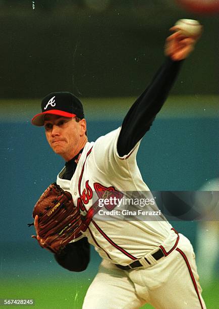 Tom Glavine pitches to the Dodgers in the 4th inning. The Dodgers were swept by the Braves in the Wild Card playoff series Saturday.