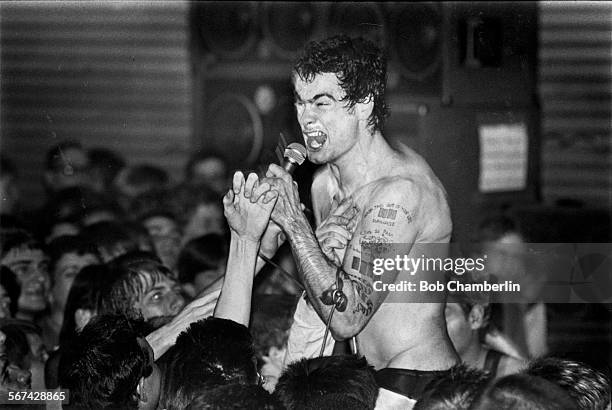 Rollins2  FILE PHOTO JANUARY 16, 1983 Lead singer of punk rock group Black Flag, Henry Rollins, stripped down to his underwear whips the crowd...