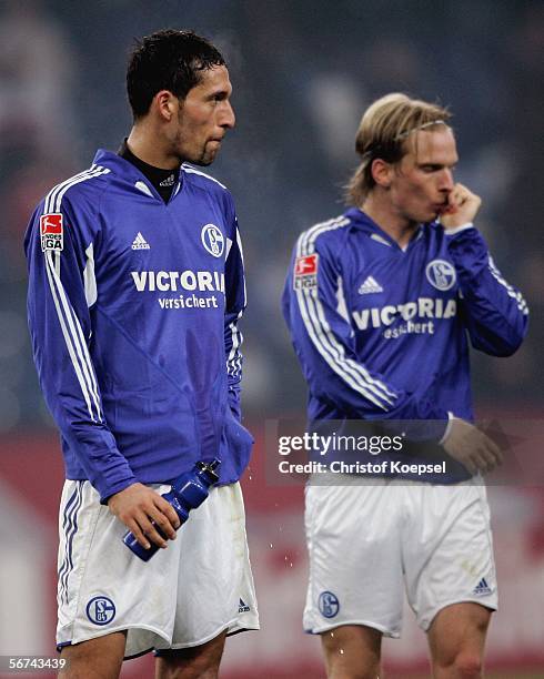 Kevin Kuranyi and Christian Poulsen of Schalke look disappointed after the 0-0 draw of the Bundesliga match between Schalke 04 and Borussia Dortmund...