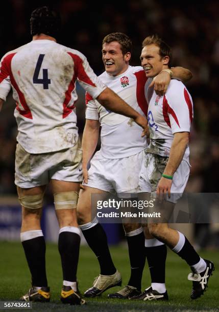 Matt Dawson of England is congratulated by team mates after scoring a try during the RBS Six Nations Championship match between England and Wales at...