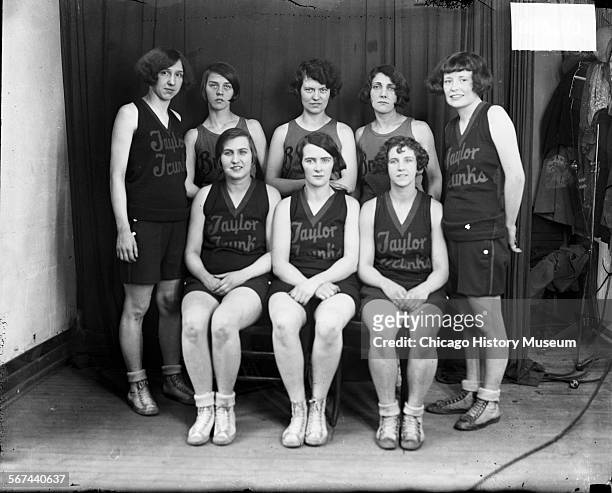 Group portrait of eight members of the Taylor Trunks women's basketball team, Chicago, Illinois, 1926.