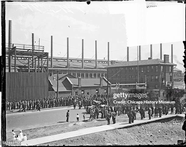 Image of a large crowd of workers outside the US Steel Corporation, Gary, Indiana, 1919. Associated with the steel strike.