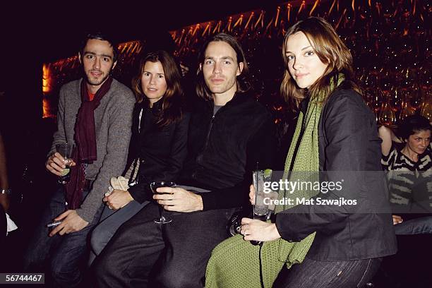 Designer Jeff Halmos, Gucci, David Neville, and Glenna Neece pose at the Rag and Bone after party held at Double Sevenon February 3, 2006 in New York...