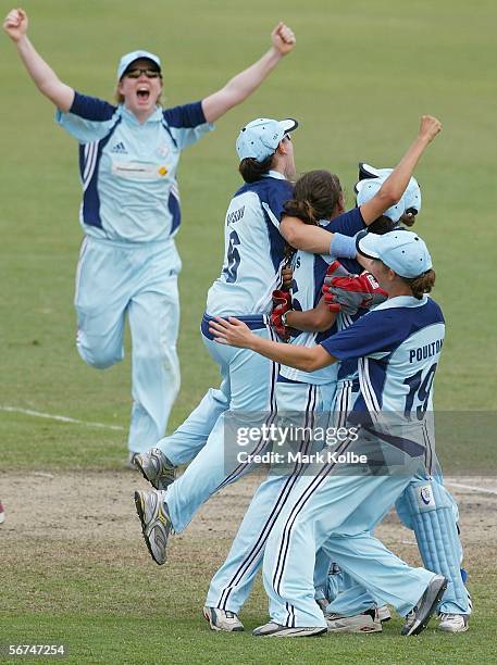 The NSW Breakers celebrate after winning the 3rd Final and clinching the series between the New South Wales Breakers and Queensland Fire at North...