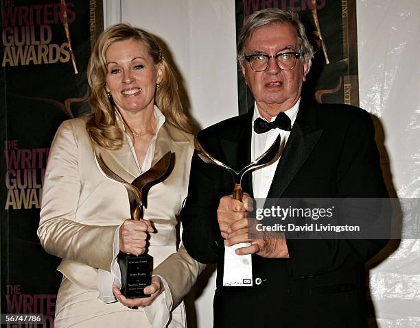 Writers Diana Ossana and Larry McMurtry pose in the press room with theTheatrical Adapted Screenplay award for "Brokeback Mountain" during the 2006...