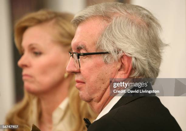 Writers Diana Ossana and Larry McMurtry pose in the press room with the Theatrical Adapted Screenplay award for "Brokeback Mountain" during the 2006...