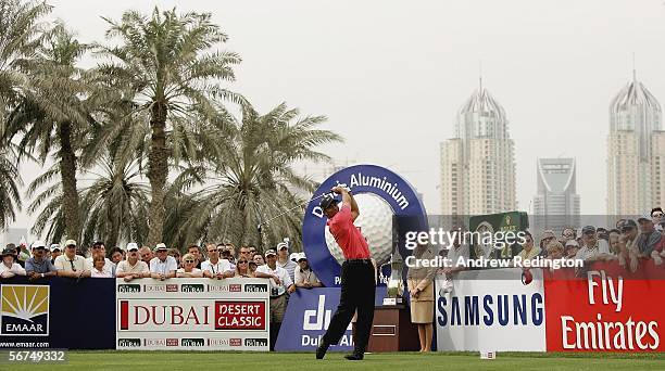 Tiger Woods of USA tees off on the first hole during the final round of the Dubai Desert Classic on February 5, 2006 on the Majilis Course at...
