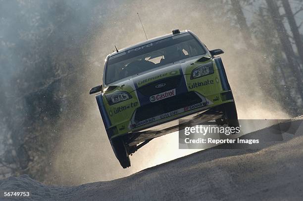 Finland's Marcus Gronholm and Timo Rautiainen drive their Ford Focus RS during day three of the Rally of Sweden February 5, 2006 in Karlstad, Sweden.