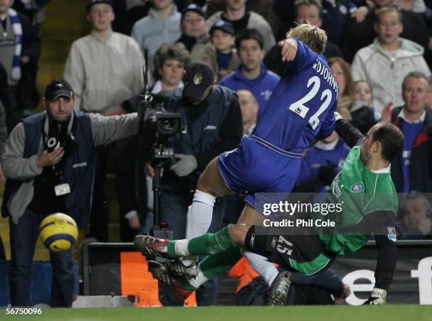 Eidur Gudjohnsen of Chelsea is tackled and fouled by Jose Reina of Liverpool during the Barclays Premiership match between Chelsea and Liverpool at...