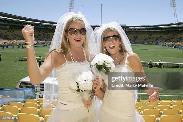 Sevens fans Olivia and Anna enjoy the atmosphere at the Westpac Trust Stadium February 04, 2006 in Wellington, New Zealand.