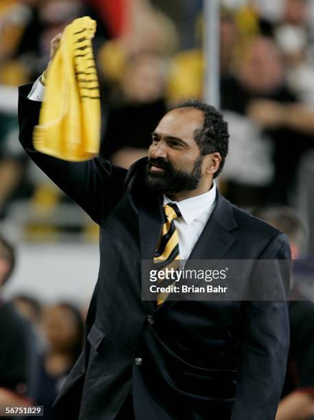 Former Pittsburgh Steelers running back and MVP of Super Bowl IX Franco Harris waves a terrible towel as he is introduced prior to SUper Bowl XL...