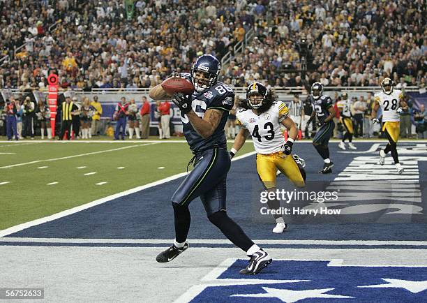 Tight end Jerramy Stevens of the Seattle Seahawks catches a 16-yard touchdown pass against Troy Polamalu of the Pittsburgh Steelers during the third...