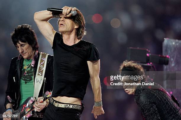 Ronnie Wood, Mick Jagger and Keith Richards of The Rolling Stones perform during the "Sprint Super Bowl XL Halftime Show" at Super Bowl XL between...
