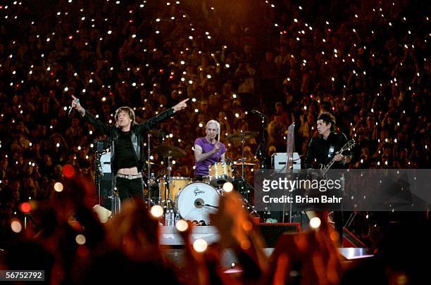 Musicians Mick Jagger, Charlie Watts and Keith Richards of The Rolling Stones perform during the "Sprint Super Bowl XL Halftime Show" at Super Bowl...