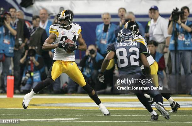 Cornerback Ike Taylor of the Pittsburgh Steelers intercepts a pass in front of wide receiver Darrel Jackson of the Seattle Seahawks in the fourth...